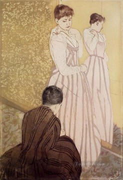 Mary Cassatt Painting - Young Woman Trying on a Dress mothers children Mary Cassatt